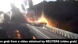 Ракетний удар біля скляного мосту в Києву 10 жовтня 2022 року 