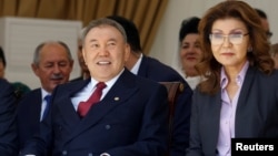 Are Nursultan Nazarbaev (left, with his daughter Darigha) themselves prepared to step into the breach this time around?