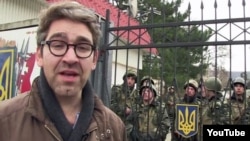 A video grab showing Vice New journalist Simon Ostrovsky reporting from Ukraine. 