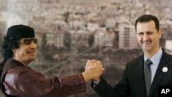 Муаммар Каддафи и Башар Асад на саммите в Дамаске (2008 год)