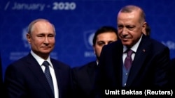 Архивска фотографија- турскиот претседател Реџеп Таип Ердоган и неговиот руски колега Владимир Путин 