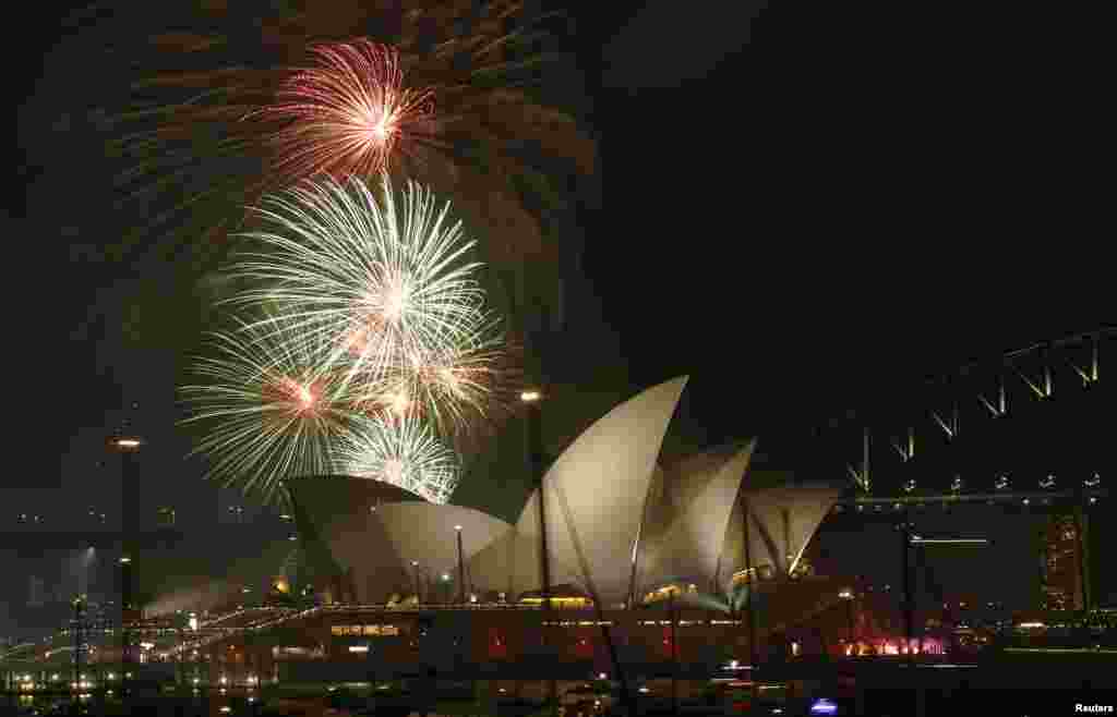 Fireworks explode over the Sydney Opera House as part of celebrations in Australia&#39;s largest city to usher in the new year on December 31. (Reuters/Jason Reed)