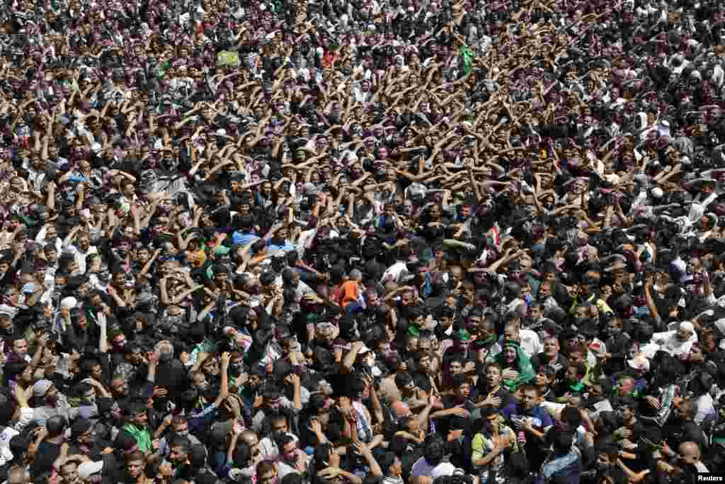 Shi&#39;ite pilgrims gather at Imam Mussa al-Kadhim shrine to mark his death anniversary in Baghdad&#39;s Kadhimiya district on May 25. (Reuters/Wissm al-Okili)