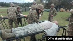 Armenia - Armenian army medics take part in a U.S.-led exercise at the Hohenfels Training Area, 19Apr2016.