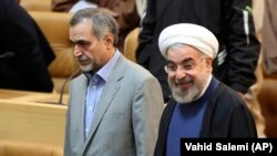 Hossein Fereidoun dogany Hassan Rohani bilen.