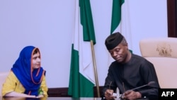 Pakistani activist Malala Yousafzai (L) speaks with Nigerian Acting President Yemi Osinbajo during her courtesy visit to the presidency in Abuja on July 17.