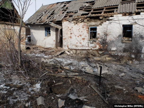 A home sits destroyed after a shell struck it in the morning hours of February 1.