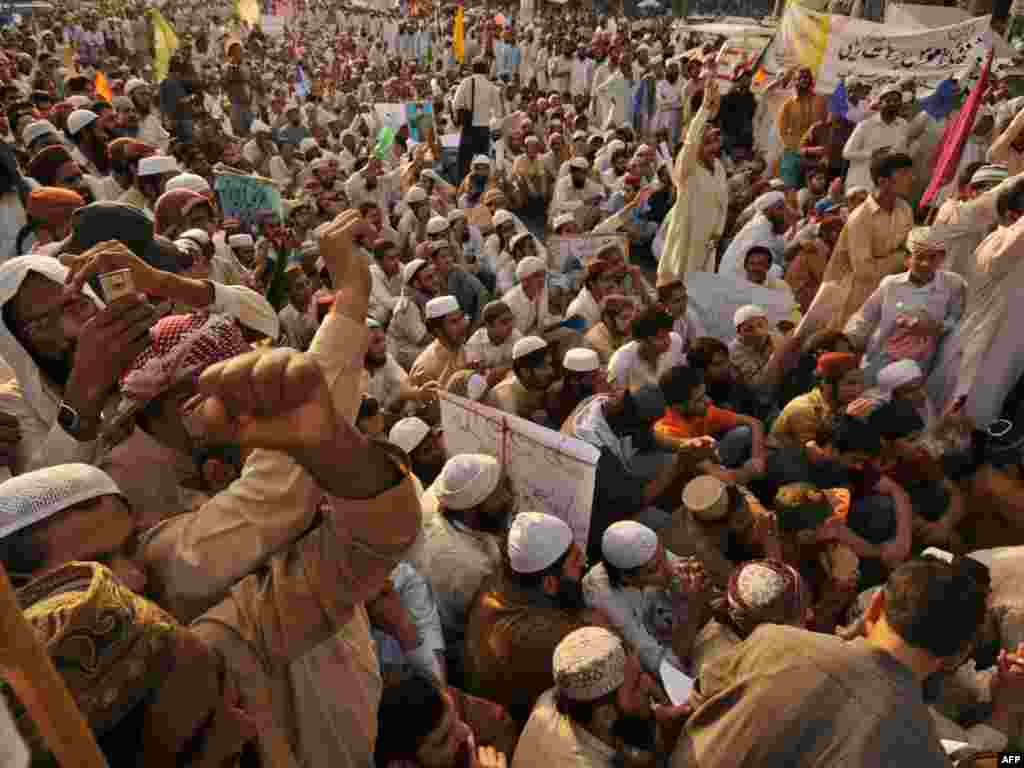 Demonstrators protest against social networking service Facebook in Lahore, Pakistan, on May 26. Pakistan temporarily blocked the Facebook and YouTube over "sacrilegious" content after a Facebook user organized an "Everyone Draw Mohammed Day" competition to promote freedom of expression, sparking a widespread backlash. Photo by AFP