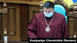 Judge Oleksandr Tupytskiy attends a Constitutional Court session in Kyiv in June 2020.