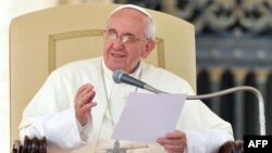 Roman Catholic Pope Francis delivers a speech during on St Peter's square at the Vatican in September.