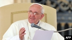 Pope Francis is urging the Vatican to be more pastors than bureaucrats. (file photo)