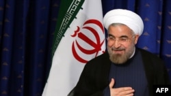 The letter says Iranians who voted for President Hassan Rohani expressed their desire for "genuine change" in all aspects of politics, including foreign policy.