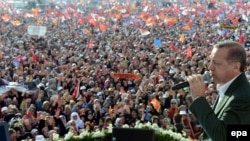 Turkish Prime Minister Recep Tayyip Erdogan addresses supporters during an election rally in Istanbul on March 23.