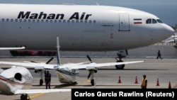 An Airbus A340-600 airplane of Iran's Mahan Air is seen at Simon Bolivar International Airport outside Caracas, April 8, 2019.