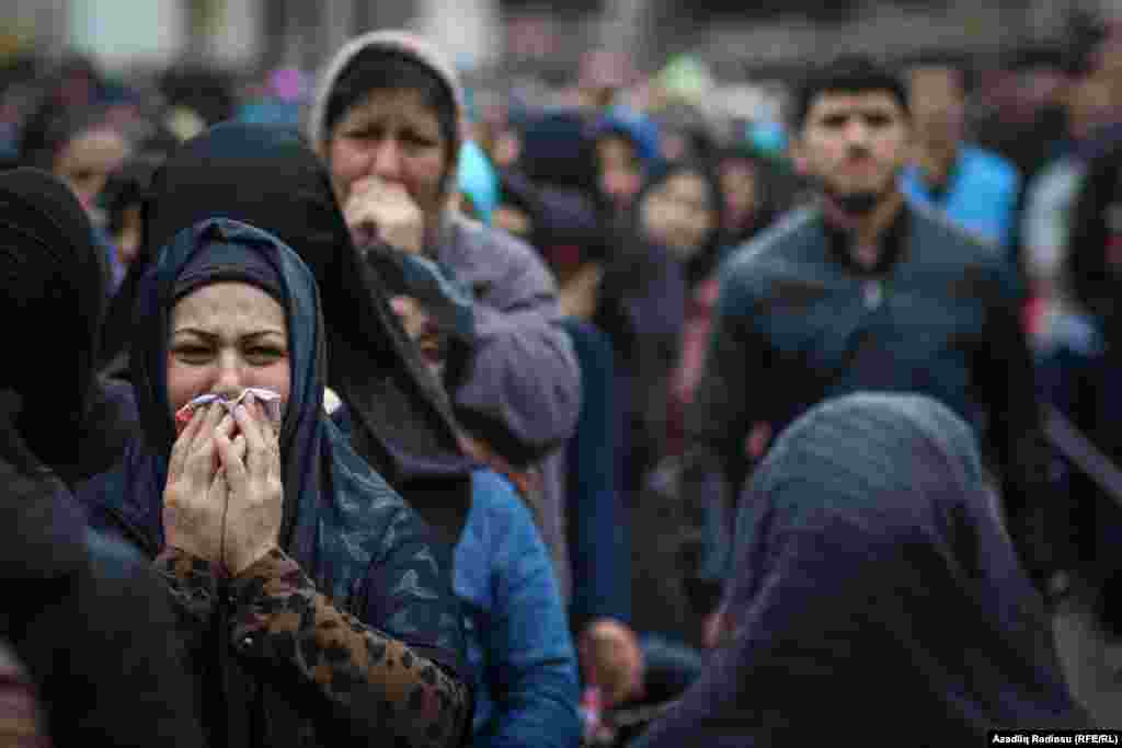 Shi&#39;ite women weep as they listen to prayers outside the Mashadi-Dadash Mosque in Baku. Displays of mourning are made throughout the festival of Ashura, which reaches its peak on October 12.