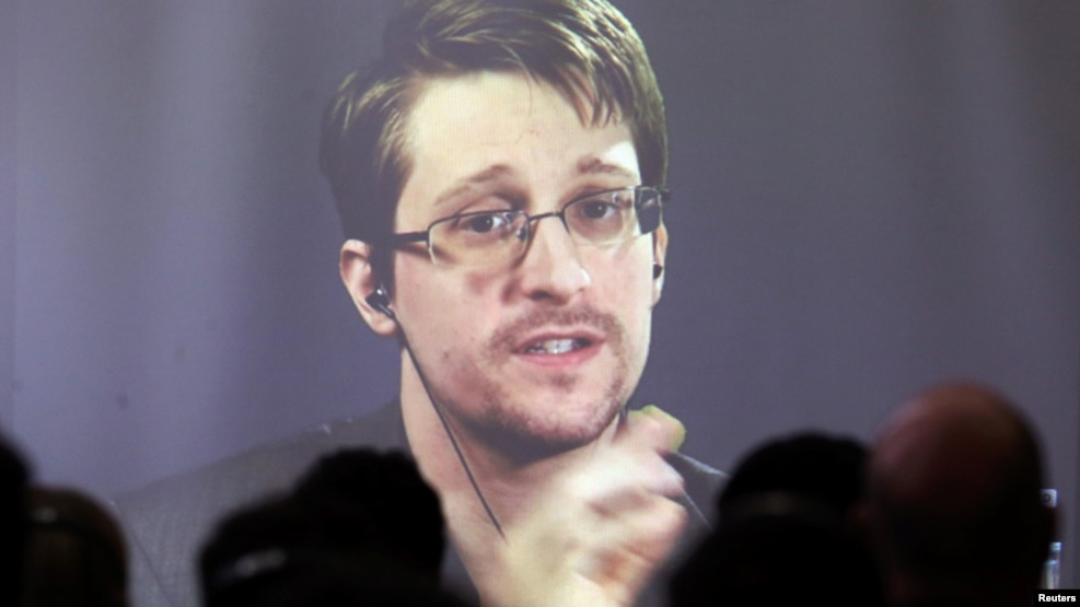 Edward Snowden speaks via video link during a conference at the University of Buenos Aires Law School in November.