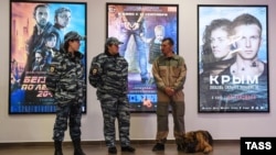 Security staff outside a preview screening of the new big-budget movie Crimea in Novosibirsk late last month. 