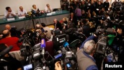 France - (L-R) Neurosurgeon Stephan Chabardes, Jean-Francois Payen, head anaesthetician at the CHU hospital, Jacqueline Hubert, director general of the hospital, and Emmanuel Gay, head of neurosurgery, attend a news conference at the CHU hospital emergenc