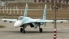 A Russian Su-27 SM fighter jet lands on the airfield of Belbek military airport outside Sevastopol, Crimea, November 26, 2014