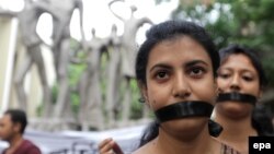 Акция протеста против изнасилований в Индии, июль 2013