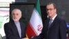 کورنل فروتسا، مدیرکل موقت آژانس بین‌المللی انرژی اتمی (راست) و علی‌اکبر صالحی، رئیس سازمان انرژی اتمی ایران در تهران. ۱۷ شهریور ۹۸