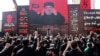 Lebanon's Hezbollah leader Sayyed Hassan Nasrallah gestures as he addresses his supporters via a screen during last day of Ashura, in Beirut, Lebanon September 20, 2018