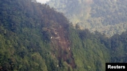 A view of the wreckage of the Russian Sukhoi Superjet-100 aircraft on Mount Salak in West Java Province