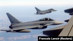 საილუსტრაციო ფოტო: გერმანიის Eurofighter-ები სამხედრო დავალების შესრულებისას. 18 სექტემბერი, 2018.