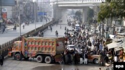 Protesters block a road linking to Islamabad to protest the execution of former police guard Mumtaz Qadri, after he was hanged to death in Rawalpindi on February 29.