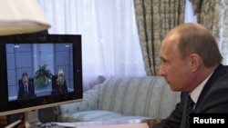 Vladimir Putin na video konferenciji povodom terorističkog napada u Moskvi, 29. mart 2010. - ilustrativna fotografija