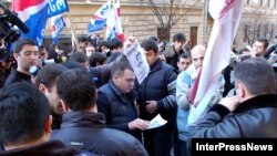 Protesters at an antigovernment rally in Tbilisi in February