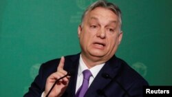 The Freedom House report describes Hungarian Prime Minister Viktor Orban as a leader who has "dropped any pretense of respecting democratic institutions." (file photo)