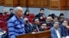 Iranian Gonabadi Dervish, Mohammad Salas who has been accused of killing police officers by bus, during his hearing session in a court in Tehran on Sunday March 11, 2018.