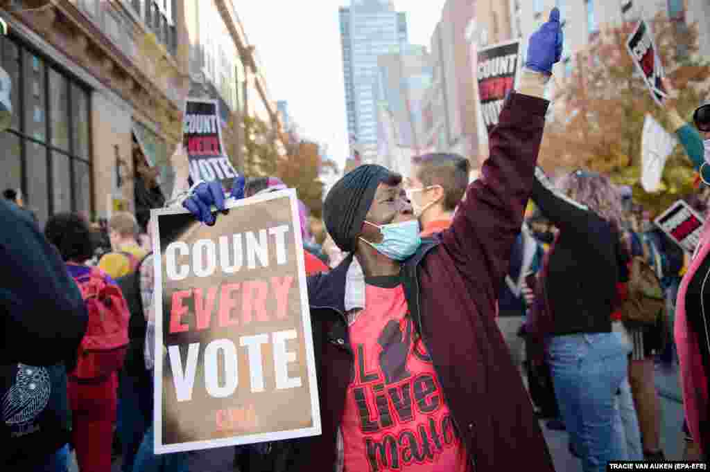People rally to demand that every vote be counted outside of the Pennsylvania Convention Center in Philadelphia, Pennsylvania, USA, 05 November 2020.