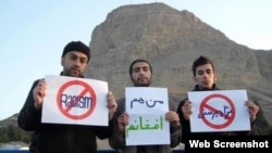 Iranians protest against the banning of Afghans in Isfahan from a public park on April 1, also known as Nature Day. One of the signs reads, "I Am Also An Afghan." 