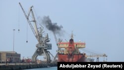 A ship unloads a cargo of fuel at the Red Sea port of Hudaydah, April 1, 2018. File photo