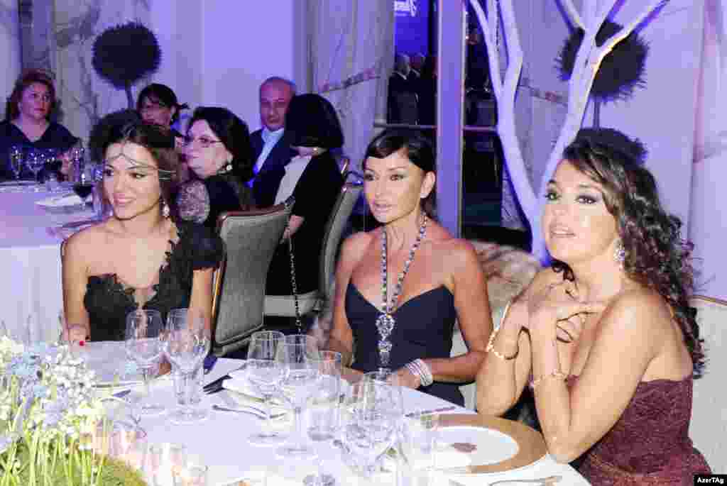 Mehriban (center) attends a presentation by &quot;Nargis&quot; magazine in January 2013 with her daughters, Leyla (right) and Arzu. U.S. diplomats have been cited in Wikileaks documents as expressing confusion between mother and daughters, fueling rumors that Aliyeva and her daughters may have undergone plastic surgery. 