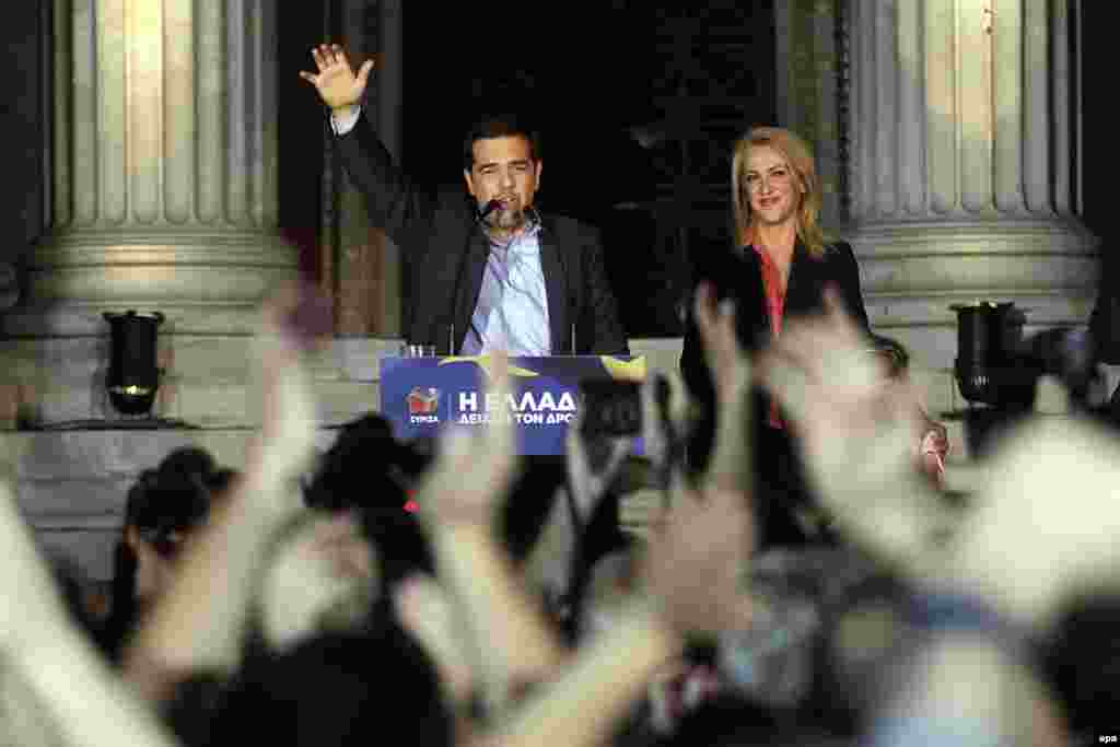 Greek parties on both the far left and far right made gains in the vote. Alexis Tsipras (left),&nbsp; the leader of the Coalition of the Radical Left (Syriza), and candidate Rena Dourou celebrate with supporters in Athens.