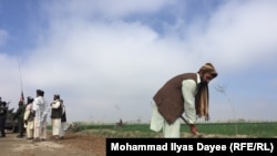 For beleaguered Afghan civilians life in a remote Afghan frontline goes on despite threats of insurgent attacks and daily battles between government forces and the Taliban.