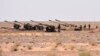 Syrian Army artillery are stationed near the village of Huraybishah, within the administrative borders of Syria's eastern Deir al-Zour Province on September 3.