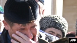 Chechen President Ramzan Kadyrov cries during the opening ceremony of a mosque in the village of Kurchaloi, outside Grozny, in October 2009.