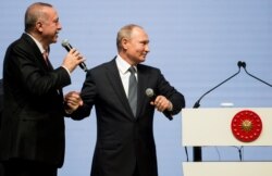 Реджеп Эрдоган и Владимир Путин на церемонии окончания прокладки по дну Черного моря подводной части "Турецкого потока". Стамбул, 19 ноября 2018 года
