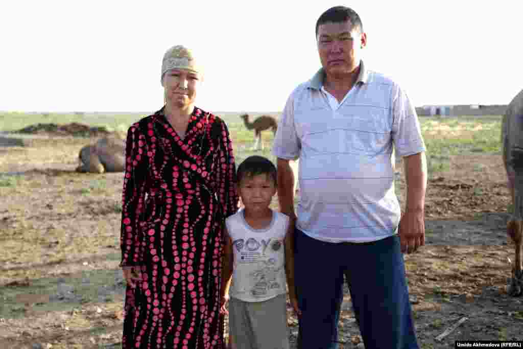 Zamira, a camel milkmaid, with her family. For the Kazakhs, the skills of camel breeding are a closely guarded secret.