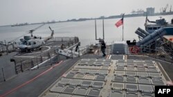 Romania -- Rocket launching hatches are seen on the USS Vicksburg cruiser ship docked at Constanta harbor, March 13, 2015