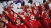 Participants wave flags of the combined Koreas before the opening ceremony of the 2018 Winter Olympics in Pyeongchang on February 9. 