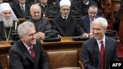 New Serbian President Tomislav Nikolic (left) and former President Boris Tadic at the National Assembly building in Belgrade