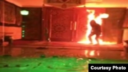 Setting fire to the entrance of Javad al-Aemmeh mosque in Tehran