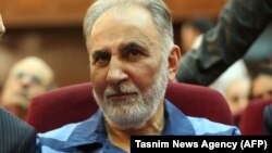 Former Tehran mayor Mohammad Ali Najafi, was found guilty of shooting his second wife, during his trial at Iran's criminal court, July 13, 2019