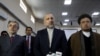 FILE: Afghan presidential candidate Mohammad Hanif Atmar, alongside his two vice-presidential candidates Younus Qanooni (L) and Mohammad Mohaqiq.