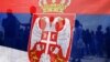 Kosovo -- Ethnic Serbs hold a Serbian national flag during an event to mark the anniversary of the 1389 Battle of Kosovo at Gazimestan, near the capital Pristina, 28Jun2013